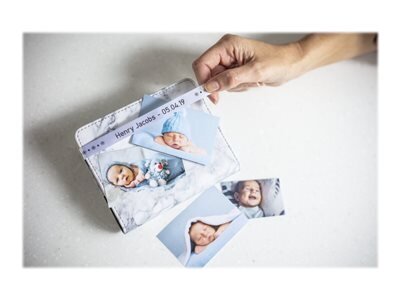 Schriftbandkassette Brother 12mmx4m weiß/schwarz n. klebend